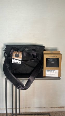 Soft sided carrying cooler with attachable ice pack