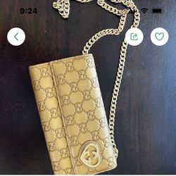 Gucci rare bronze wallet on a chain with interlocking hearts