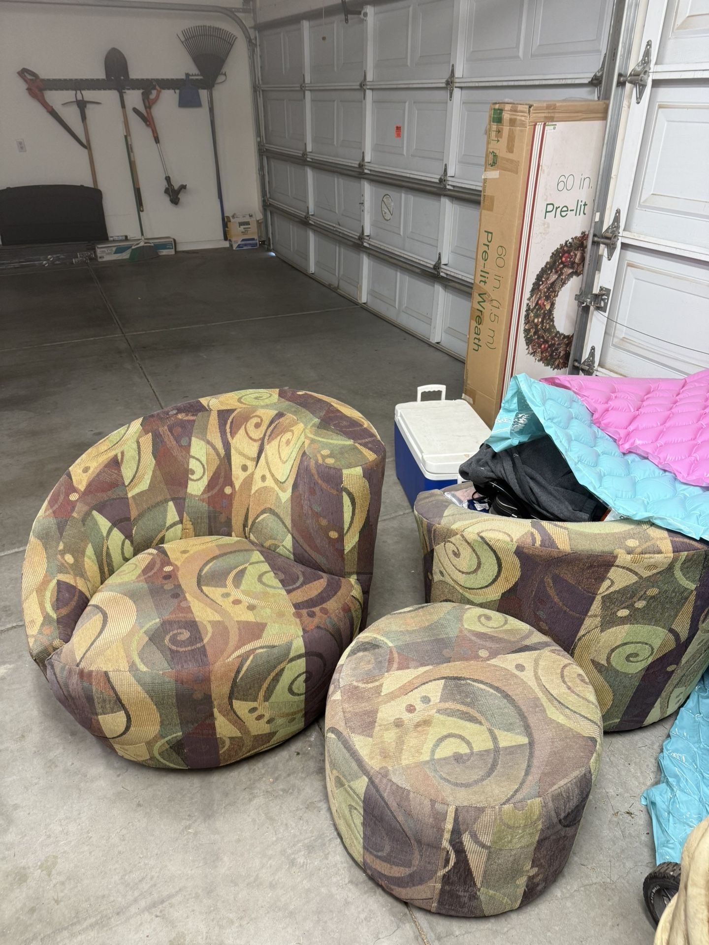 Two Swivel Chairs And Ottoman