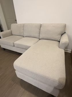 Stark light gray fabric soft sofa with reversible chaise
