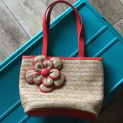 BEUNO~Stylish straw tote bag with red handles and flower decoration~Excellent condition This bag has been used ONE TIME ONLY Pick up four mile cove pa