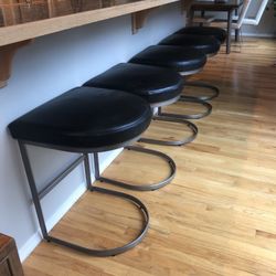 Black leather counter stools