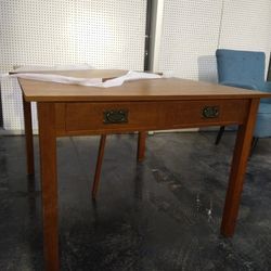 Stakmore expanding table, (from desk size to card table to dining table)