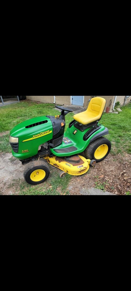 JOHN DEERE L120. 48" CUT. 20HP. RUNS GREAT. 900.00