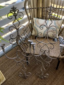 A pair of candle holders