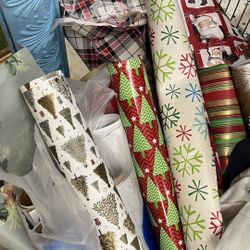 Large collection of assorted wrapping paper 