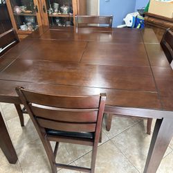 Dark 36”high Fold Out table Table 36”x 54” & 4 Chairs  