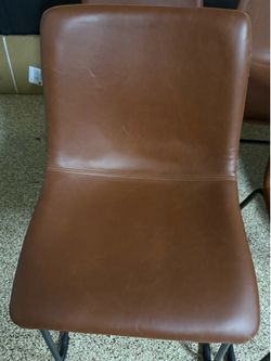 Cognac faux leather chairs from AtHome