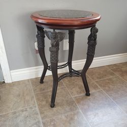Mid-20th-century (likely 1960s–1970s) Egyptian Revival / Empire-style accent or pedestal table.