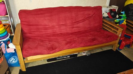 Wooden futon bed couch and matching armchair set