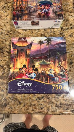 Disney Thomas Kinkade 750-Piece Puzzle and others