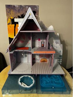 Wooden house for dolls with pool