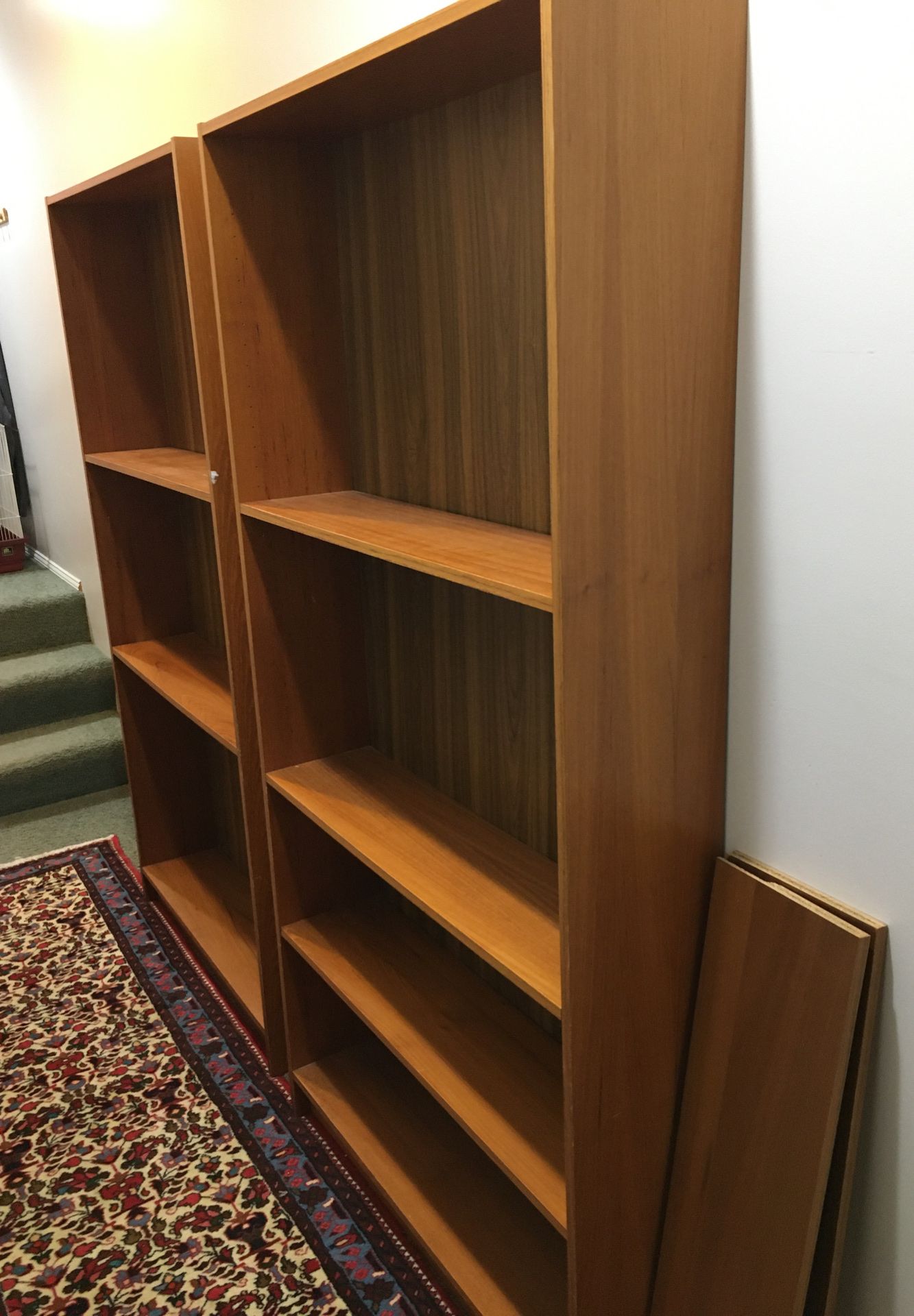 Two wooden bookshelves