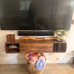 Floating wood media console with drawer