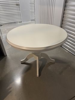 White pedestal table