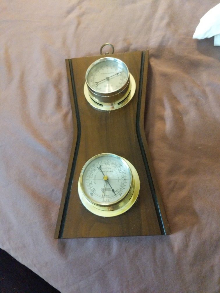 Thermometer And A Barometer