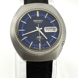 Vintage 1971 Seiko DX automatic watch, 39mm size case, 8in wrist leather band. 