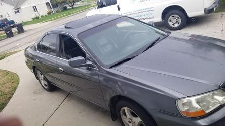 2002 Acura tl 3.2. Trade for 3rd row vehicle. Not a minivan.