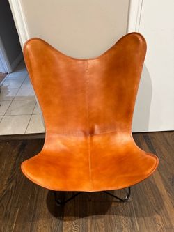 Unique Leather chair with metal legs