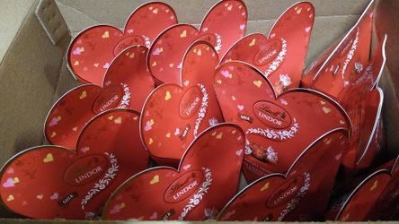 Lindt milk chocolate balls mini hearts . 2 oz