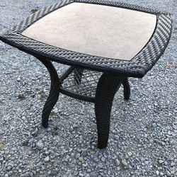 Wicker and glass side table