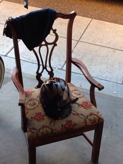 XLarge half helmet and antique dinning room chair