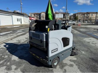Parking lot sweeper