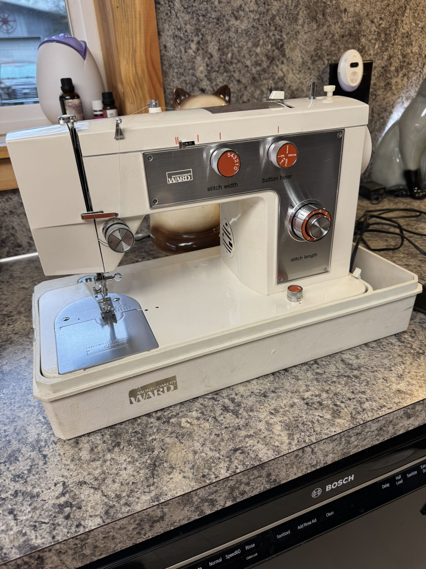 Montgomery Wards MODEL NO. UHT J1276 Portable Sewing Machine With Protective Carrying Case