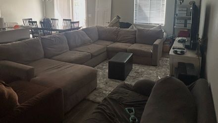 Free large tan sectional- first come gets it.