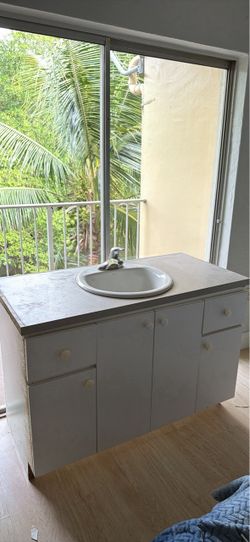 White Bathroom Vanity with Sink and Faucet