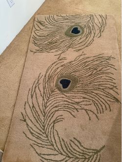 Peacock area rug