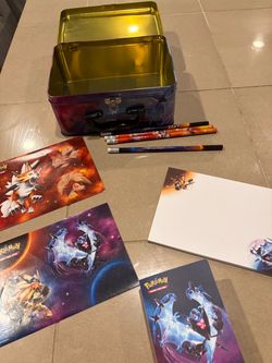 Pokémon metal box with unused stickers, pencils, book for cards and notebook