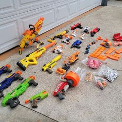 Large Nerf Gun lot. Includes multiple Nerf blasters, Fortnite blasters, Rival blasters, magazines, darts, scopes, and more