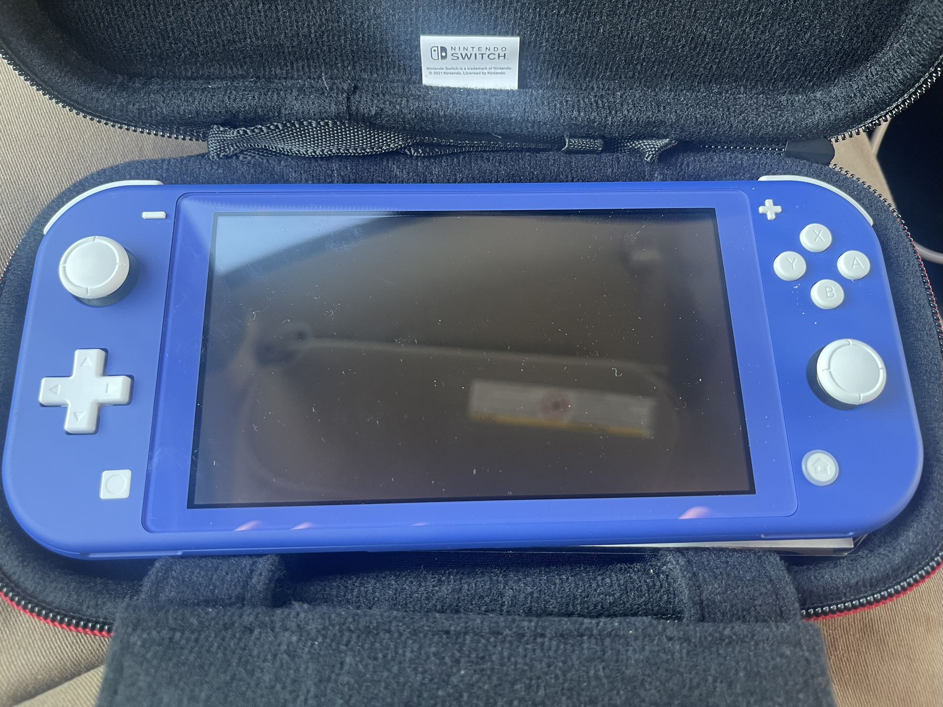Nintendo Switch lite (blue)  - Brand new!  W/ Case & 128 GB SD Card