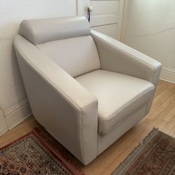 TWO Leather Swivel Chairs