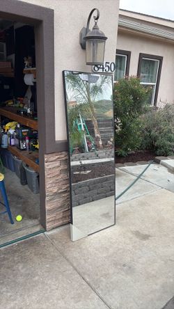 Wall hang mirror.