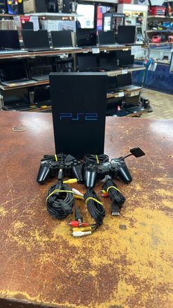 Sony PlayStation 2 w/ 2 controllers