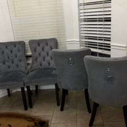 Urgent Sale 4 velvet dining chairs (gray), in very good and clean condition. Elegant design and very comfortable. 
