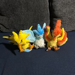 Sitting cuties from the Pokemon Center Moltres, Zaptos, Articuno