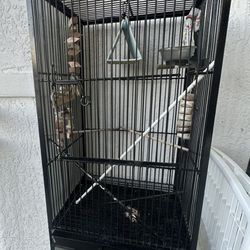 LARGE BIRD CAGE WITH BIRD TOYS AND BIRD BED