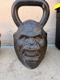 Heavy 90 lb kettlebell is a cast iron Onnit Bigfoot Primal Bell. This black weight has a 2.5 pood rating and a sculpted face design.