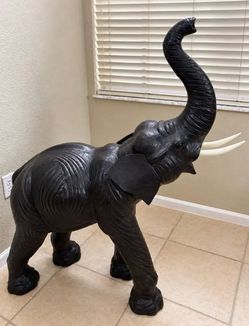 Large Elephant Statue with Raised Trunk