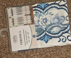 2 blue floral curtains