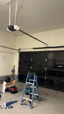 Garage Door Opener Broken Spring Off Track Replace Adjustment And Parts