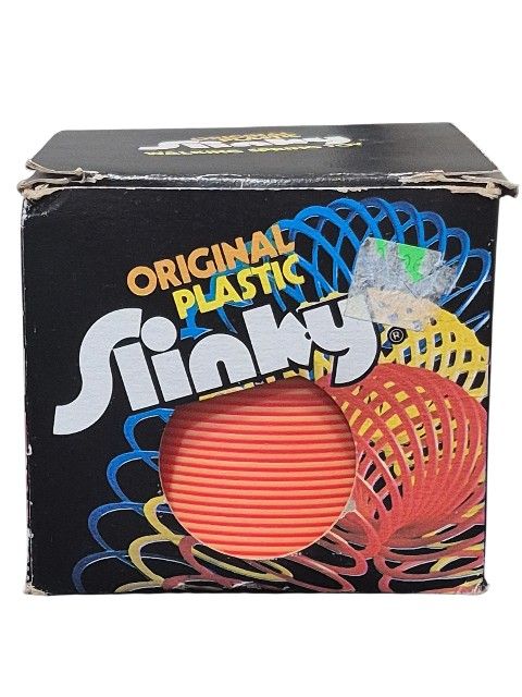 Original Neon Orange Plastic Slinky in Box