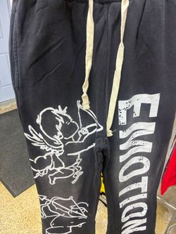 DESIGNER SWEATS