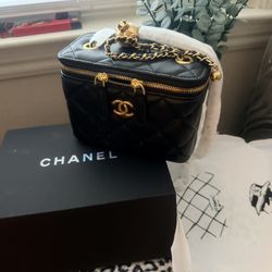 The perfect gift for her . New with box & dust bag  Black & Gold Accents 