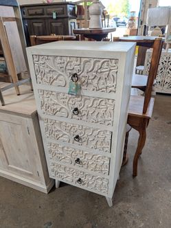 Five drawer carved tall boy