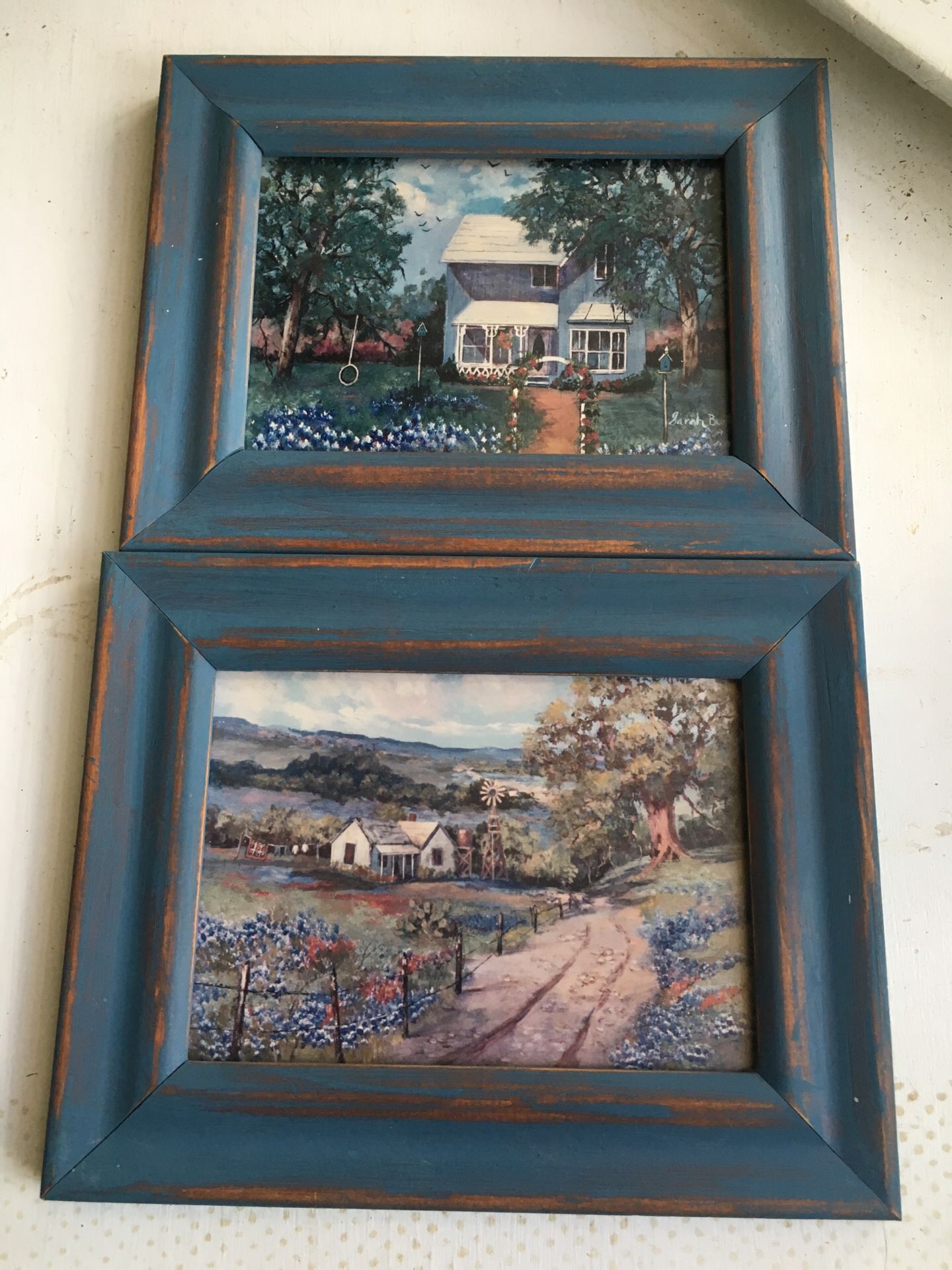Framed photographs of a house and farm house with windmill and blue bonnets non glare glass