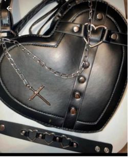 Brand new Set of 2 Faux or PU Leather Heart Shaped Purse w/ Matching PU Leather snap Wrist Band